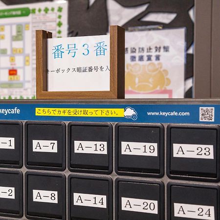かりゆしコンドミニアムリゾート那覇スカイリビングホテル旭橋駅前 Naha Esterno foto