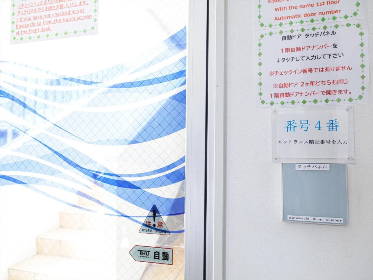 かりゆしコンドミニアムリゾート那覇スカイリビングホテル旭橋駅前 Naha Esterno foto